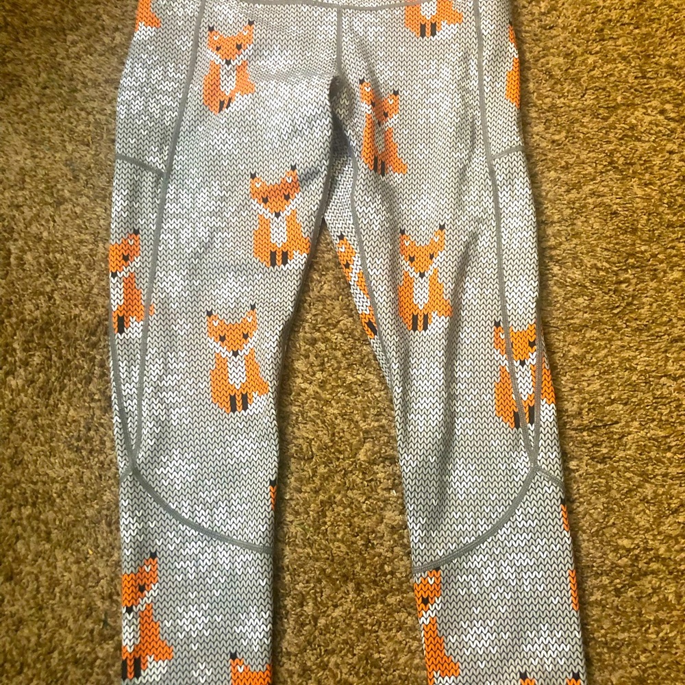 Feed Me Fight Me fox/snowflake leggings.